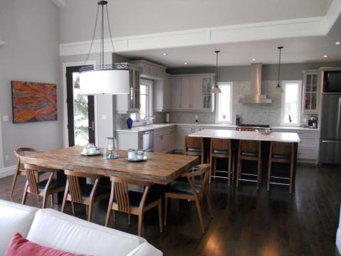 Eclectic Dining Room with white millwork at chrown moulding height