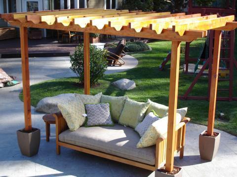 Traditional Patio with light wood stained trellis