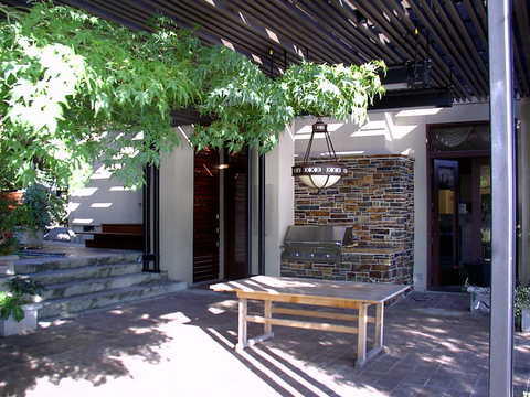Modern Patio with variegated brick countertop base