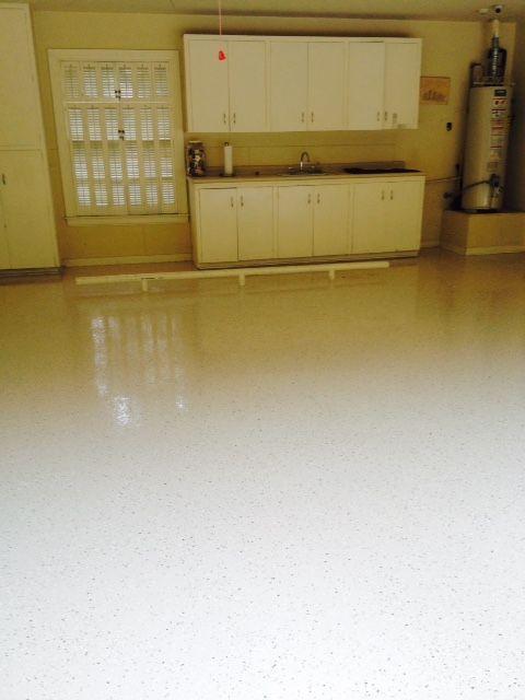 Transitional Garage with epoxy coated garage floor