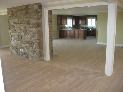 Traditional Family Room with white support columns