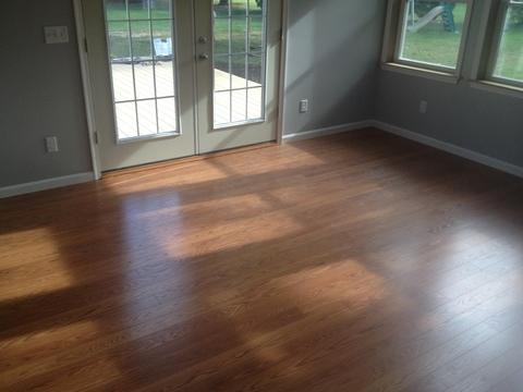 Traditional Sunroom with tongue and groove flooring