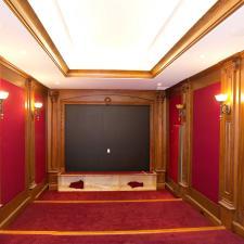 Traditional Home Theater with picture frame moulding