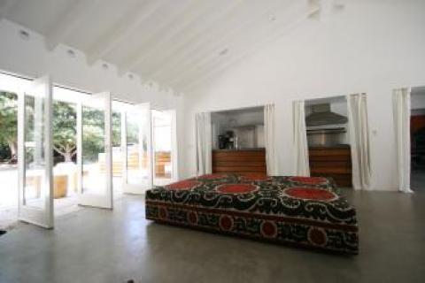 Contemporary Sunroom with all glass doors open to outside