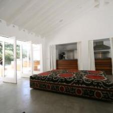 Contemporary Sunroom with all glass doors open to outside