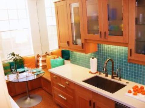 Eclectic Kitchen with medium wood stained cabinets