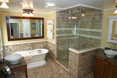 Transitional Bathroom with black and white granite counter top