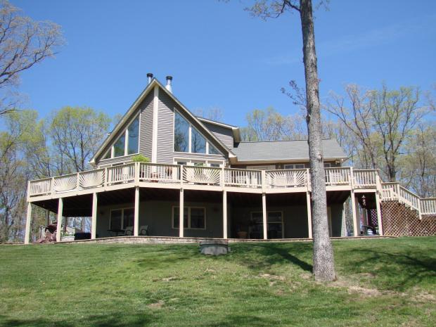 Contemporary Home Exterior In Warrenton Wrap Around Deck Grass