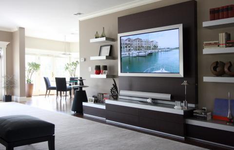 Contemporary Family Room with dark wood built-in media center