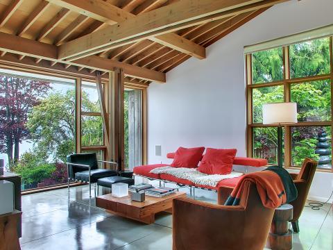 Modern Family Room with light wood stained millwork