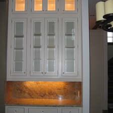 Transitional Library with white flat front cabinetry