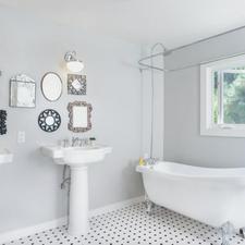 Eclectic Bathroom with white and black tiled floor