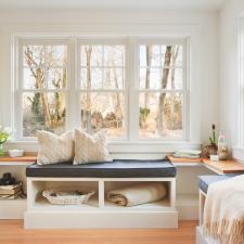 Transitional Sunroom with functional small sitting area