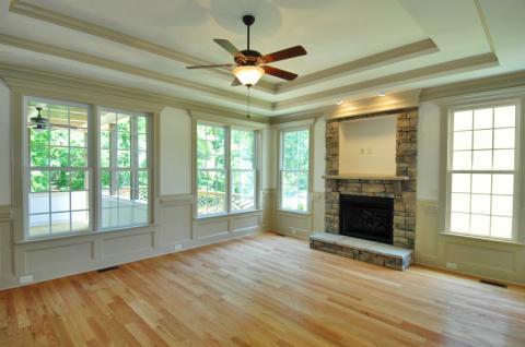 Traditional Family Room with brown laminate laminate flooring