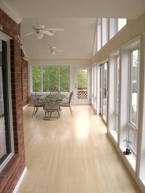 Traditional Sunroom with off white painted walls