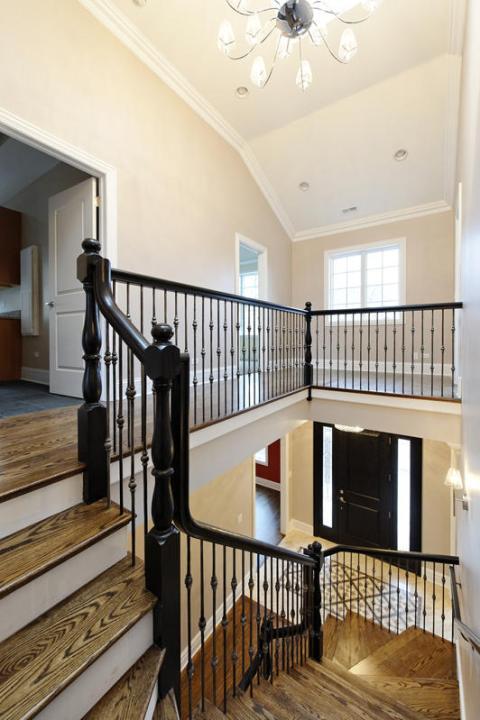 Traditional Entry with white french doors to bedroom