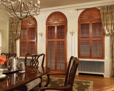 Traditional Dining Room with dark wood dining table and chairs
