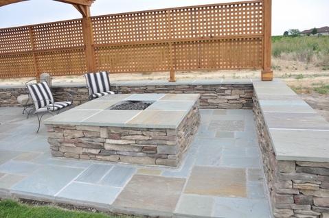 Contemporary Patio with square fire pit