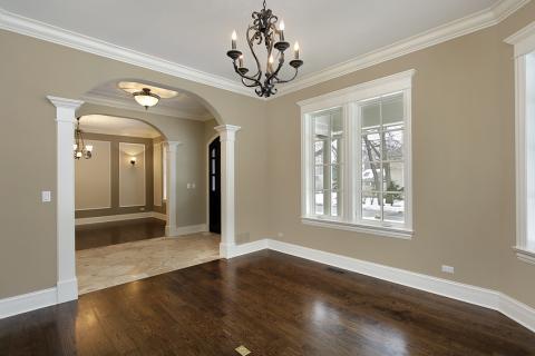 Traditional Family Room with dark hardwood flooring