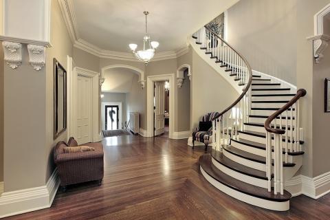Traditional Entry with dark stained handrails
