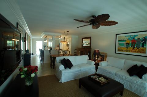 Eclectic Family Room with long room open to dining and kitchen