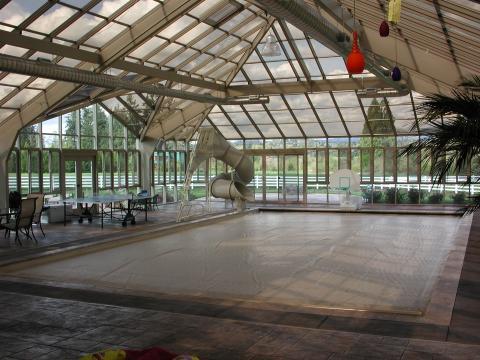 Contemporary Sunroom with all walls and ceiling glass and metal