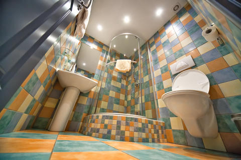 Eclectic Bathroom with small silver foot lever top garbage