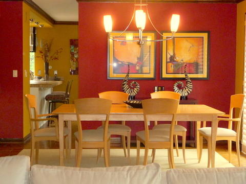 Modern Dining Room with dark wood crown moulding