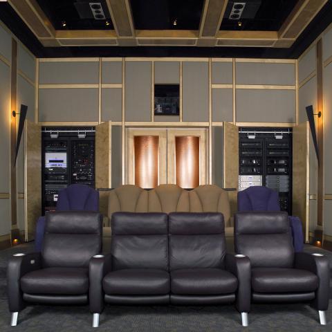 Contemporary Home Theater with built-in hardware cabinets