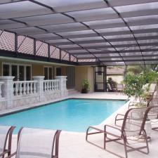 Traditional Pool with outdoor patio lounge furniture