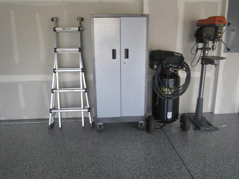 Contemporary Garage with metal storage cabinet