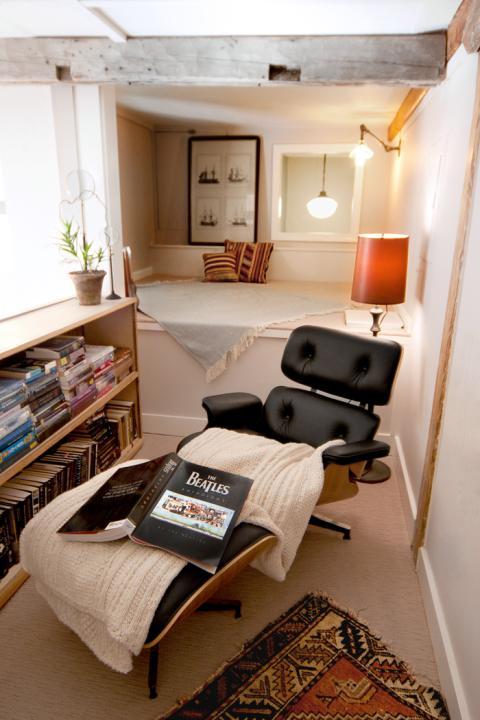 Transitional Library with black floor lamp with red shade