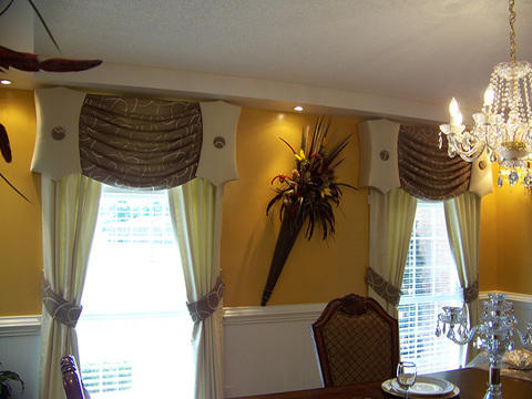 Art Deco Dining Room with upholstered window treatments