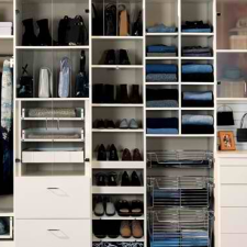 Traditional Closet with multiple hanging racks
