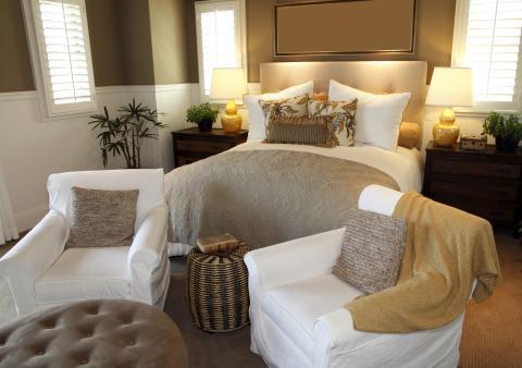 Transitional Bedroom with yellow bedside reading lamps with white shade