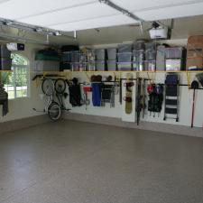 Casual / Comfortable Garage with shelf for plastic storage bins