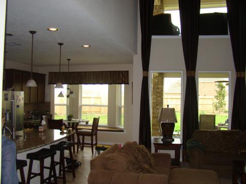 Traditional Family Room with stainless steel appliances