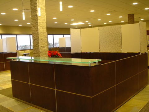 Contemporary Home Office with glass raised bar counter