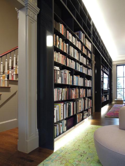 Transitional Library with detailed wood work door frame
