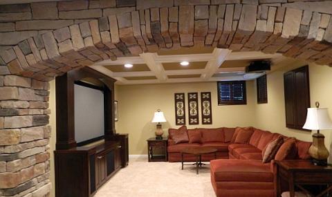 Traditional Family Room with dark wood built-in wall hung cabinet