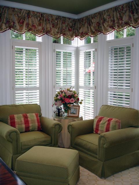 Traditional Family Room with green and red stripped throw pillows