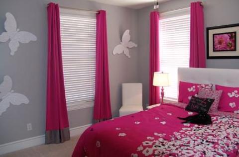 Contemporary Kids Room with bright pink duvet cover with flower accents