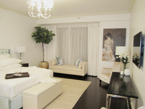 Transitional Bedroom with black wood top console table