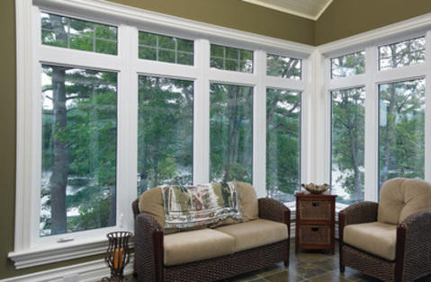 Transitional Sunroom with white trimmed windows