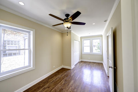 Transitional Sunroom with white painted millworks