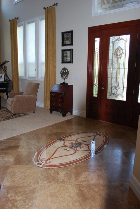 Traditional Entry with inlayed stone floor