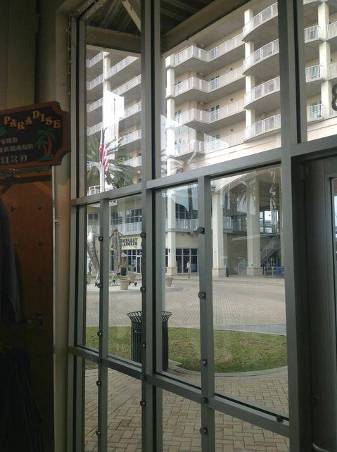 Contemporary Sunroom with bottom floor of condo building
