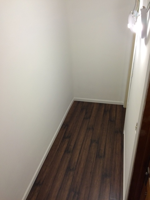 Traditional Closet with sliding closet doors