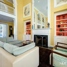Traditional Living Room with creme leather couch