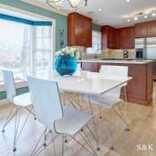 Transitional Dining Room with stainless steel appliances